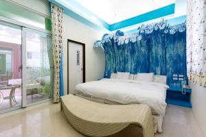 Giường trong phòng chung tại GJia Taitung B&B