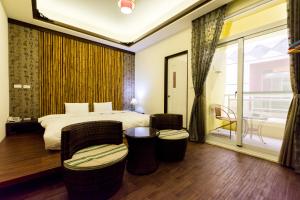 Giường trong phòng chung tại GJia Taitung B&B