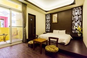 Giường trong phòng chung tại GJia Taitung B&B