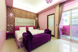 Giường trong phòng chung tại GJia Taitung B&B