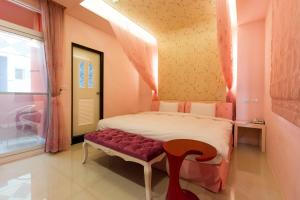 Giường trong phòng chung tại GJia Taitung B&B