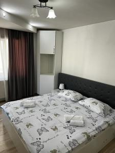Ένα ή περισσότερα κρεβάτια σε δωμάτιο στο Apartament 3 Central +6 φωτογραφίες