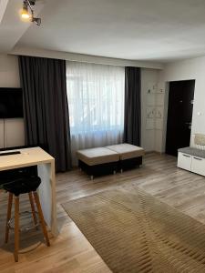 Ένα ή περισσότερα κρεβάτια σε δωμάτιο στο Apartament 3 Central