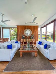 A seating area at Ubuntu Beach Villas by Reveal