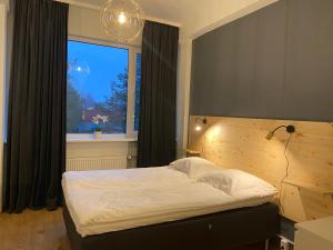 Postel nebo postele na pokoji v ubytování Apartment24 Savi 34