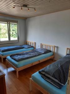 Postel nebo postele na pokoji v ubytování Dimai House No 31 Dornbirn Messe