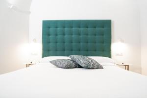 Postel nebo postele na pokoji v ubytování Casa Renato Amalfi