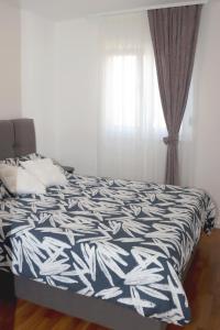 Posteľ alebo postele v izbe v ubytovaní Apartment Sparkle near the sea and the river