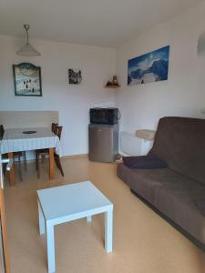 Posedenie v ubytovaní Appartement A proximité d'Ax les thermes + 23 fotografií