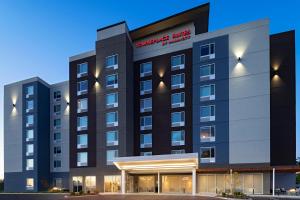 a rendering of the outside of a hotel at TownePlace Suites by Marriott Brentwood in Brentwood