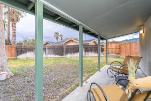 a patio with a table and chairs and a fence at NEW Charming Country Style 3B2B in Glendora