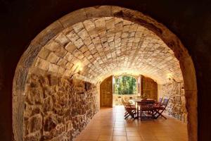 Posedenie v ubytovaní Masia Mas d'en Bosch Casa Rural Baronia de Rialb
