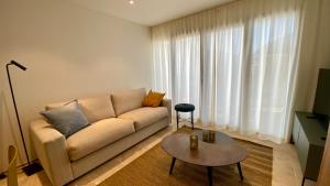 Posedenie v ubytovaní Les Papillons du Ventoux - Le Myrtil- éénslaapkamerappartement met terras en tuin
