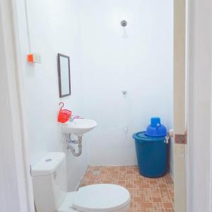 Koupelna v ubytování Scott Camotes Beach House