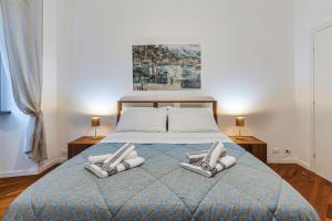 Postel nebo postele na pokoji v ubytování Luxury suite Como + 14 fotografií