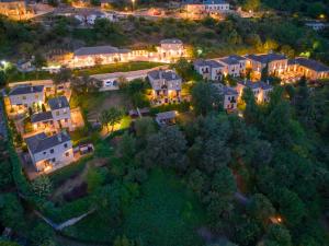 an aerial view of a home at night at Aristi Mountain Resort in Aristi