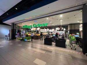 a view of a viking grocery store with people in it at [PROMO]Connected train 1 Bedroom (ABOVE MALL)6 in Kuala Lumpur