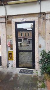 a door in the side of a building at Alloggi Gerotto Calderan 3 in Venice