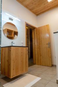 a bathroom with a sink and a mirror at Umutuzo lodge Kivu lake 