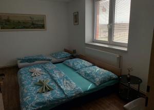 Posteľ alebo postele v izbe v ubytovaní Pension Sara