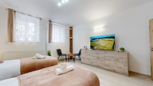 Ένα ή περισσότερα κρεβάτια σε δωμάτιο στο Villa City Park +10 φωτογραφίες