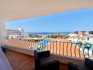 A balcony or terrace at Adeje beach apartament + Parking