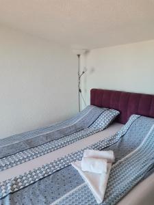 Postel nebo postele na pokoji v ubytování Jelly Apartment