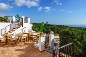 A balcony or terrace at Luxurious villa with pool in La Cala by Costarentals - Ref 53