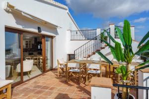 A balcony or terrace at Luxurious villa with pool in La Cala by Costarentals - Ref 53
