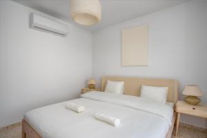 A bed or beds in a room at Luxurious villa with pool in La Cala by Costarentals - Ref 53