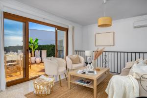 A seating area at Luxurious villa with pool in La Cala by Costarentals - Ref 53