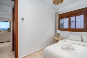 A bed or beds in a room at Luxurious villa with pool in La Cala by Costarentals - Ref 53