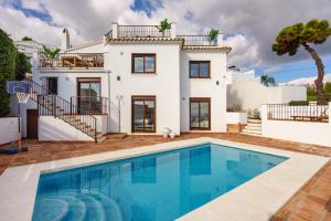 The swimming pool at or close to Luxurious villa with pool in La Cala by Costarentals - Ref 53