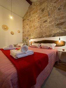 Ένα ή περισσότερα κρεβάτια σε δωμάτιο στο Casa de Morão +28 φωτογραφίες