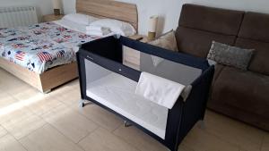 Ένα ή περισσότερα κρεβάτια σε δωμάτιο στο Hotel Riviera Sanremo