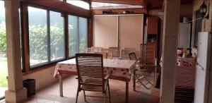 a dining room with a table and some chairs at Albergue de Peregrinos Ultreia et Suseia in Sigüeiro