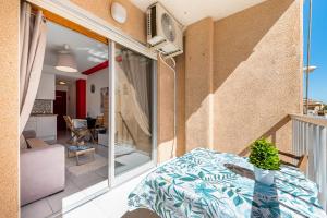A bed or beds in a room at Estudio Sunrise Estocolmo