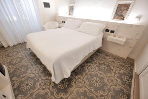 A bed or beds in a room at Dimora San Giuseppe