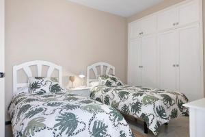 Posteľ alebo postele v izbe v ubytovaní Apartamento La Estrella 5