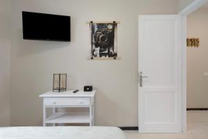 Televízia a/alebo spoločenská miestnosť v ubytovaní Apartamento La Estrella 5