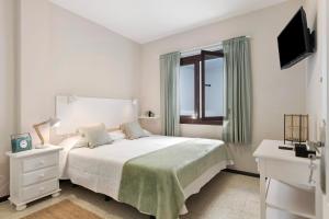 Posteľ alebo postele v izbe v ubytovaní Apartamento La Estrella 5