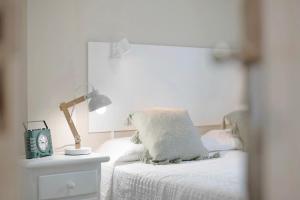 Posteľ alebo postele v izbe v ubytovaní Apartamento La Estrella 5