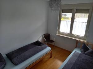 Postel nebo postele na pokoji v ubytování Dimai House No 31 Dornbirn Messe