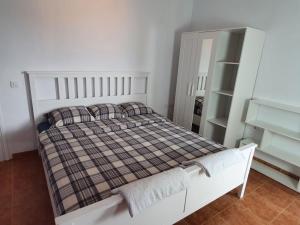 Postel nebo postele na pokoji v ubytování Finca la fortaleza