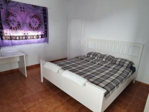 Postel nebo postele na pokoji v ubytování Finca la fortaleza