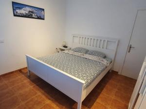 Postel nebo postele na pokoji v ubytování Finca la fortaleza