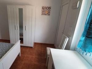 Postel nebo postele na pokoji v ubytování Finca la fortaleza