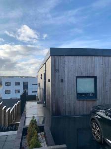 a building with a television on the side of it at Lovely 2 bedroom condo in Reykjavík