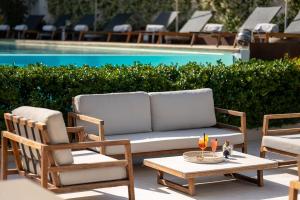 בריכת השחייה שנמצאת ב-Unìco Boutique Hotel d'Arte או באזור