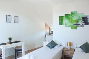 Postel nebo postele na pokoji v ubytování Studio apartmani Alex Doll